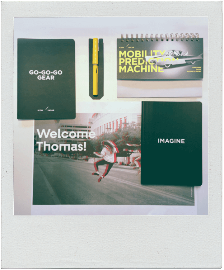A polaroid picture of my desk on my first day at icon incar
